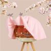 Una copertura di fiori di ciliegio rosa per una gabbia per uccelli Geo budgie