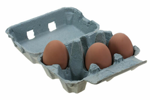 Scatola delle uova blu con tre uova