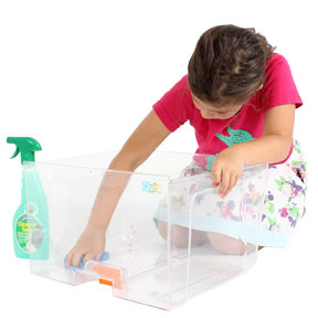 Girl wipes down bedding tray of the Qute.