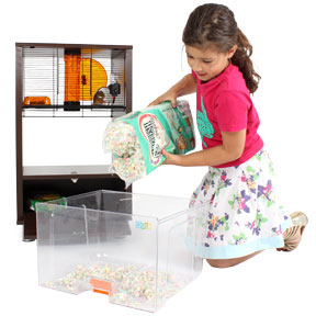 Girl refills bedding tray of the Qute.